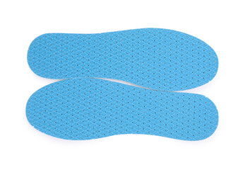 Pair of insoles on white background, top view