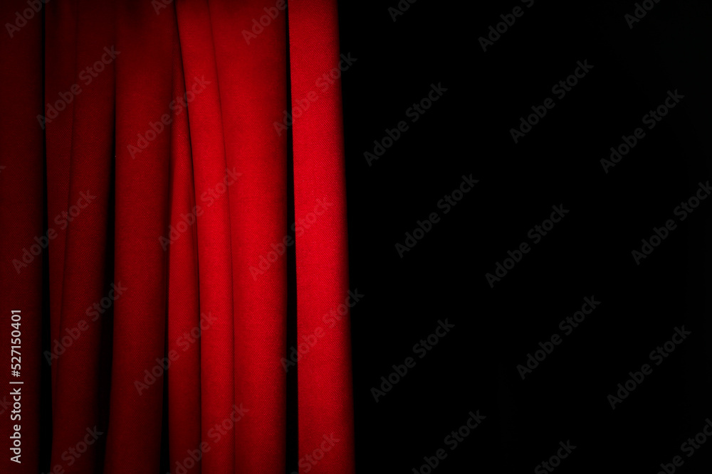 Wall mural Open elegant red front curtains on black background. Space for text