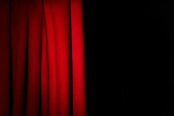 Open elegant red front curtains on black background. Space for text