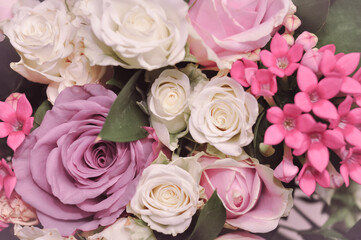 Close up of fresh pink,white and violet roses bouquet, gift for women