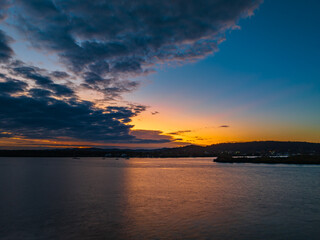 Sunrise over the bay with cloud cover moving in
