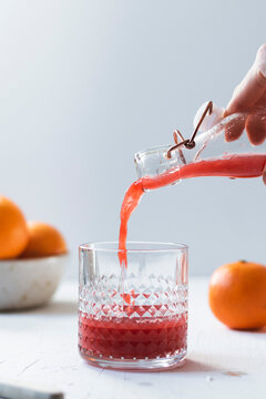 Orange Juice Being Poured In To A Glass