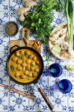 Thai Turkey Meatballs In Coconut Red Curry Sauce with ginger, garlic, and red curry paste
