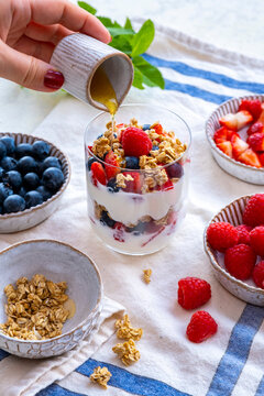 Yogurt Parfait Breakfast in a galss with fresh fruits