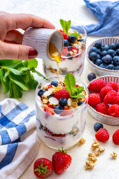 Yogurt Parfait Breakfast in a galss with fresh fruits