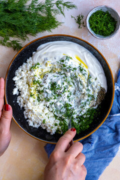 Turkish haydari meze dip topped with fresh mint leaves and olive oil