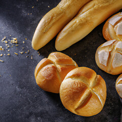 Bakery with various types of freshly baked bread. Buns, baguette, bagel, sweet bread and croissant. Close up. 3D representation