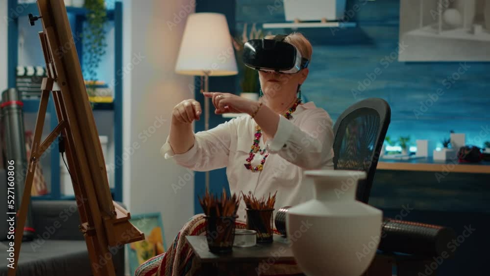 Aufkleber senior woman using vr glasses with augmented reality to create drawing of vase for art and craft ski