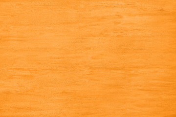 Fototapeta premium Texture of orange wooden surface as background, top view