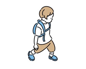 リュックを背負って歩く男の子