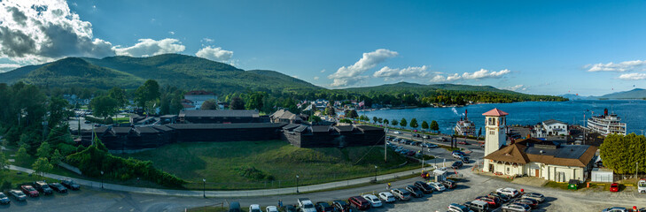 Fototapeta na wymiar Panoramic aerial view of Lake George New York popular summer vacation destination with colonial wooden fort William Henry