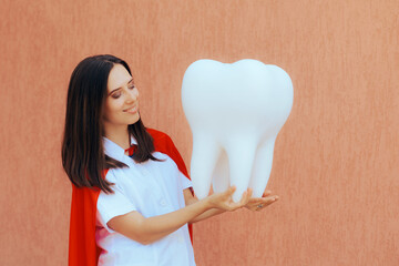 Superhero Dentist Woman Holding a Large Molar. Happy super doctor caring for teeth health of...