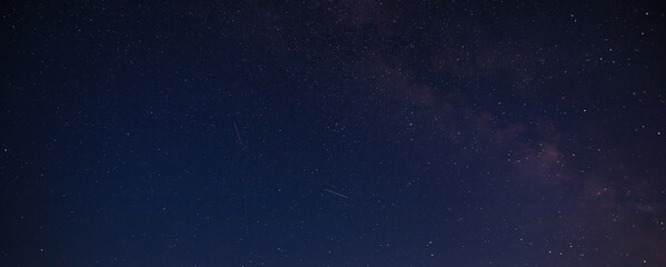 Starry sky, night landscape. View of the Milky Way galaxy.