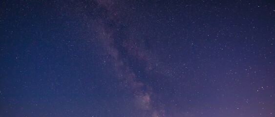Starry sky, night landscape. View of the Milky Way galaxy.