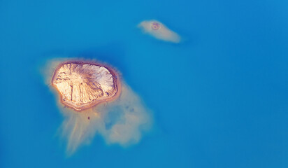 A small deserted island in the ocean