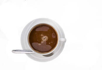 Brown Coffee in a white cup and saucer with a spoon. Transparent