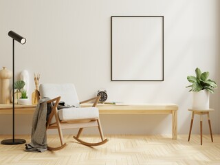 Poster frame mockup with gray armchair in working room interior background.