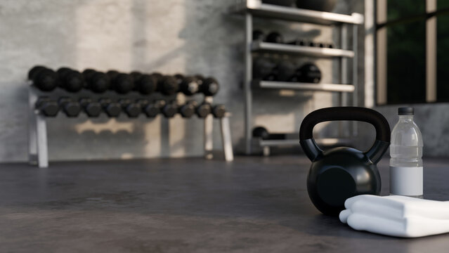 Sport equipments, Kettlebell, towels, bottle water and empty space on gym floor
