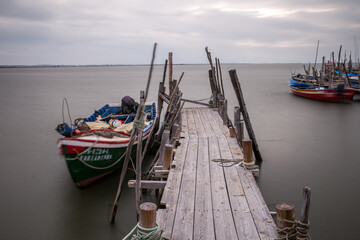 stilt pier of carrasqueira in Portugal. Traditional fishing village.