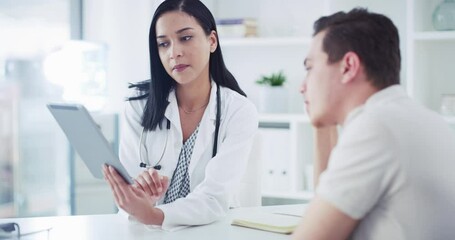 Doctor with a digital tablet consulting a patient in a hospital medical care appointment. Healthcare expert talking and discuss feedback with a man about health and wellness result in a clinic