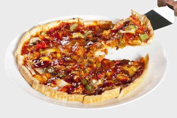 pizza pie with red sauce and lifted slice 