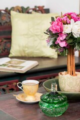table setting with Colourful Topiary flower arrangement