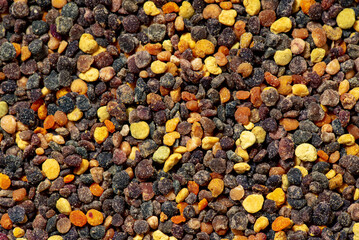 Pile of bee pollen on white