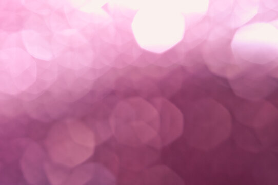Pink violet abstract background with round bokeh circles