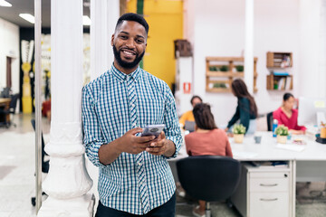 African Business Man Using Phone