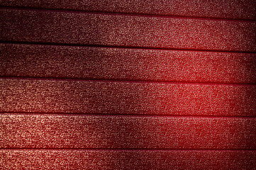 Fototapeta premium Red material, Intense industrial background.