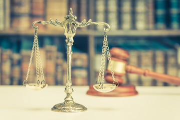 Legal office of lawyers or attorneys, justice and law concept : Brass balance scale of justice on a...