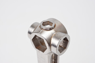 Universal compact metal wrench, for quick and easy repair of equipment.