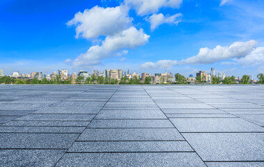 Empty square floor and city skyline with modern buildings scenery