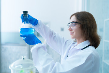 The scientist doctor created a vaccine against the coronavirus.Coronavirus 2019-nCoV Blood Sample. virus outbreaking.Technician holding blood tube test in the research laboratory