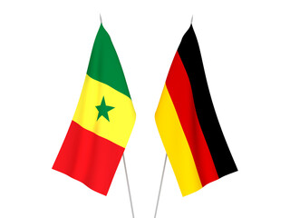 National fabric flags of Germany and Republic of Senegal isolated on white background. 3d rendering illustration.