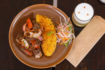 Lomo Saltado con Tacu Tacu