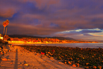 Passing winter storm at sunset on the beach in Montecito California