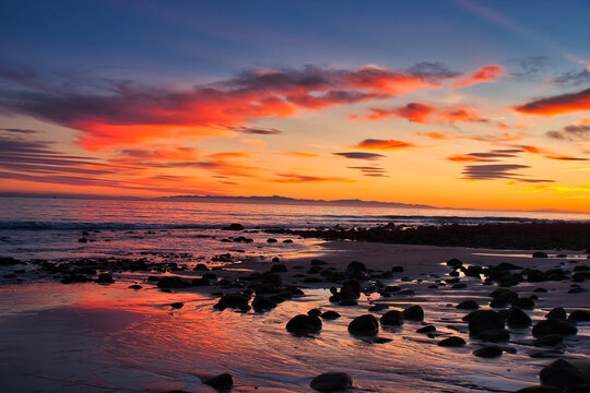 Passing winter storm at sunset on the beach in Montecito California