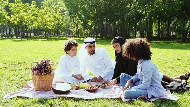 cinematic and storytelling clip video of a family from the emirates spending time at the park in Dubai