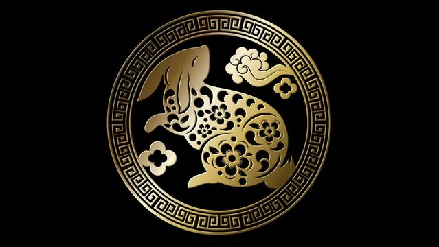 Chinese zodiac year of the Rabbit 2023 astrological sign loop glittering gold particles symbolized fortune and prosperity. Icon with alpha channel ready for overlay
