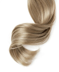 Long blond curly hair on white background. A part of blond hair for design.