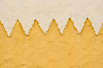 Colorful artistic detail of orange-painted pattern facade. horizontal High-quality photo