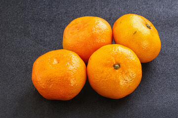 Fresh ripe juicy yellow mandarin