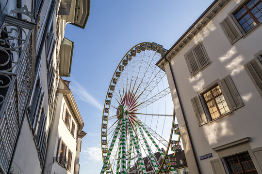 Basel, Switzerland - October 24, 2016: Big ferris wheel for the autumn market in the city center