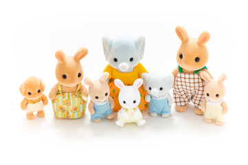 Animal doll isolated on white background. Miniature dollhouse toy. Kids toy. Animal character. Play and learn. Kids room. Childhood. Kindergarten toy. Developmental toys.
