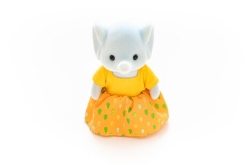 Elephant doll isolated on white background. Miniature dollhouse toy. Kids toy. Animal character. Play and learn. Kids room. Childhood. Kindergarten toy. Developmental toys.
