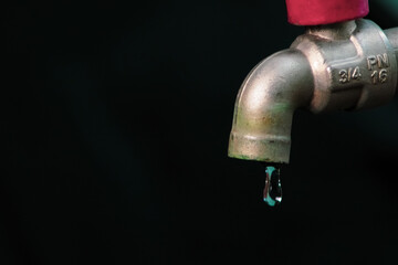 A faucet where the water does not flow. The concept of water scarcity and the water crisis