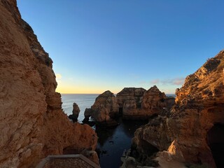 Coves and cliffs at Ponta da Piedade Algarve region, in Portugal At Sunrise. 