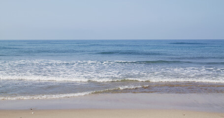 Sea wave over the sand beach