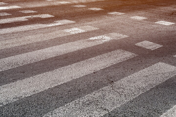 Pedestrian zebra crossing on asphalt road